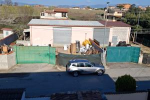Terreno 1000mq con magazzino e appartamento