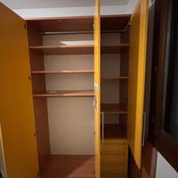 Armadio tre ante con cassetti 