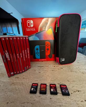 Nintendo switch OLED + 12 giochi + microSD 64gb