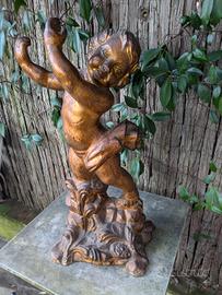 scultura putto in terracotta 