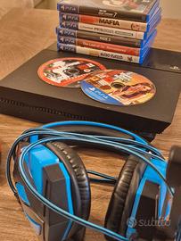 playstation 4 500gb + 8 giochi + joystick +cuffie