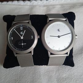 2 orologi CK "Lei e Lui" in acciaio
