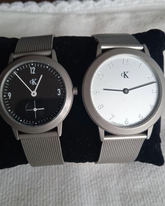 2 orologi CK "Lei e Lui" in acciaio