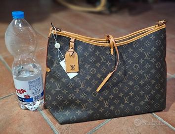 Bella  borsa elegante, raffinata e capiente  L