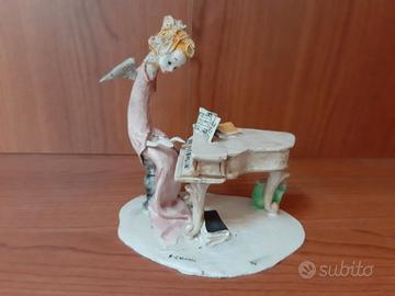 Statuina ceramica Adriano Colombo Lo Scricciolo