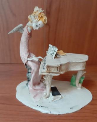 Statuina ceramica Adriano Colombo Lo Scricciolo
