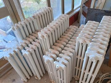 9 termosifoni in ghisa bianchi