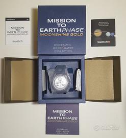 Omega swatch moonshine gold