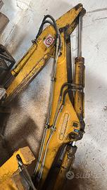 Retro escavatore \ carro uva