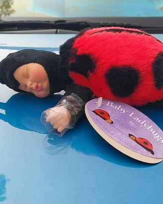 Neonato coccinella - ferma porta