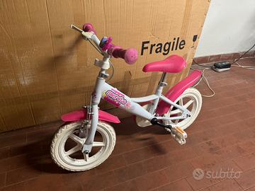 Bicicletta per bambina con rotelle removibili