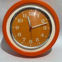 Orologio arancione vintage modernariato