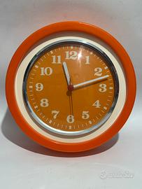 Orologio arancione vintage modernariato