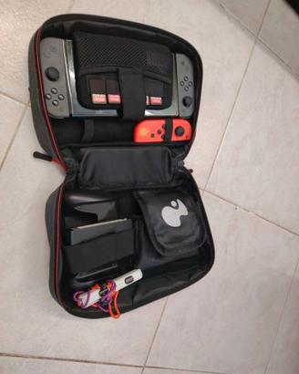 Console Nintendo switch oled scarlatto e violetto