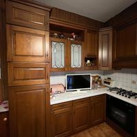 Cucina in legno ad angolo