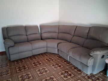divano angolare ,con due pedane  relax 