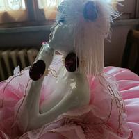 Bambola ceramica letto