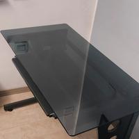 Scrivania in vetro fumé con ripiano estraibile