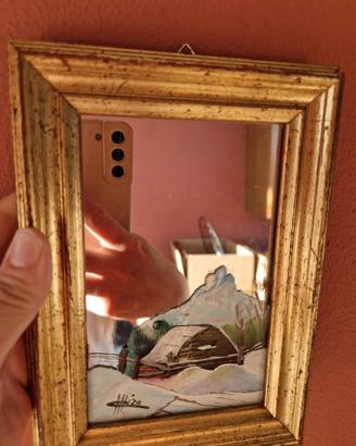 Quadro con immagine dipinta e specchio