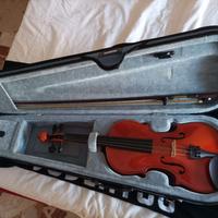 Violino con i rispettivi libri 