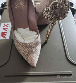 John Richmond

Décolleté Beige Tacco Oro