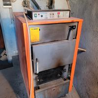 caldaia thermorossi a legna