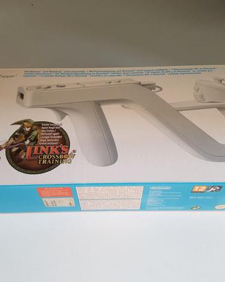 Wii console con comandi e videogiochi