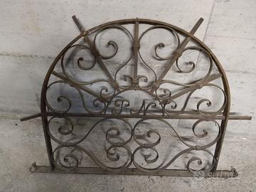 sopra porta in ferro battuto