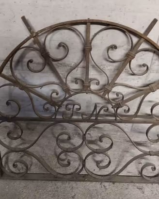 sopra porta in ferro battuto