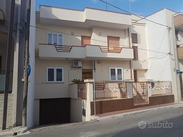 Fabbricato appartamenti, terreno e garage