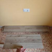 pavimento laminato grigio/beige circa 45mq