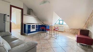 GIFFONI SEI CASALI Mansarda arredata