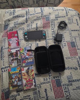 Nintendo switch lite + 5 giochi + accessori