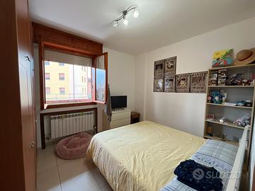 Camera in appartamento condiviso terrazzo e garage