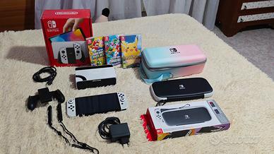 Nintendo Switch OLED con dock/accessori + 3 giochi