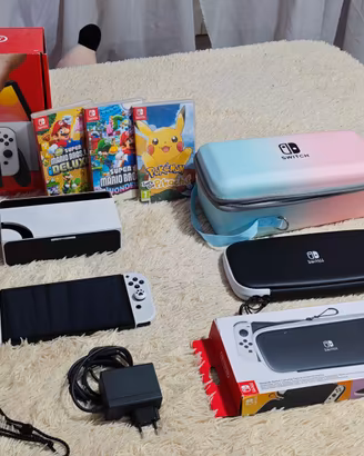 Nintendo Switch OLED con dock/accessori + 3 giochi