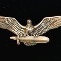 Charm argento aquila con piuma Navajo