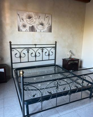 Letto in ferro battuto con rete