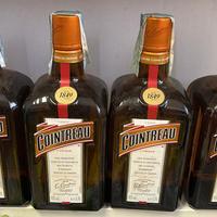 Quattro bottiglie di cointreau