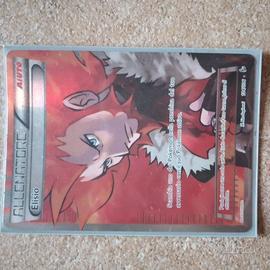 Elisio allenatore 104/106 carta Pokémon