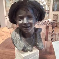 Testa di bambino in bronzo di Giovanni De Martino.