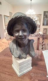 Testa di bambino in bronzo di Giovanni De Martino.