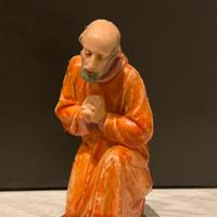 Statuina inginocchiato