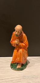 Statuina inginocchiato