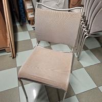 Sedie impilabili in metallo e tessuto