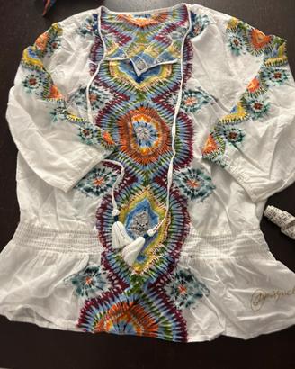 Tunica con ricami e nappine desigual