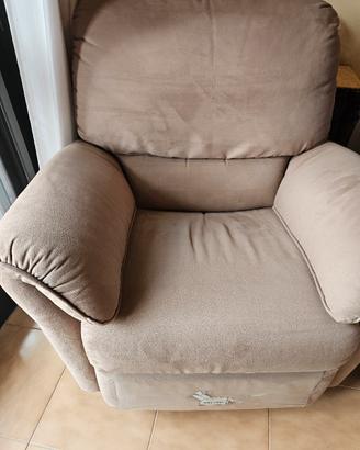 Poltrona comfort Natuzzi,  in tessuto beige