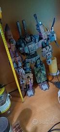 Jinbao Warbotron Bruticus e Jinbao Devastator