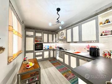 PORZIONE DI TRIFAMILIARE A CARIGNANO