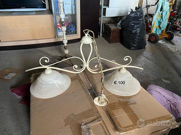 Lampadario e piantana in ferro battuto